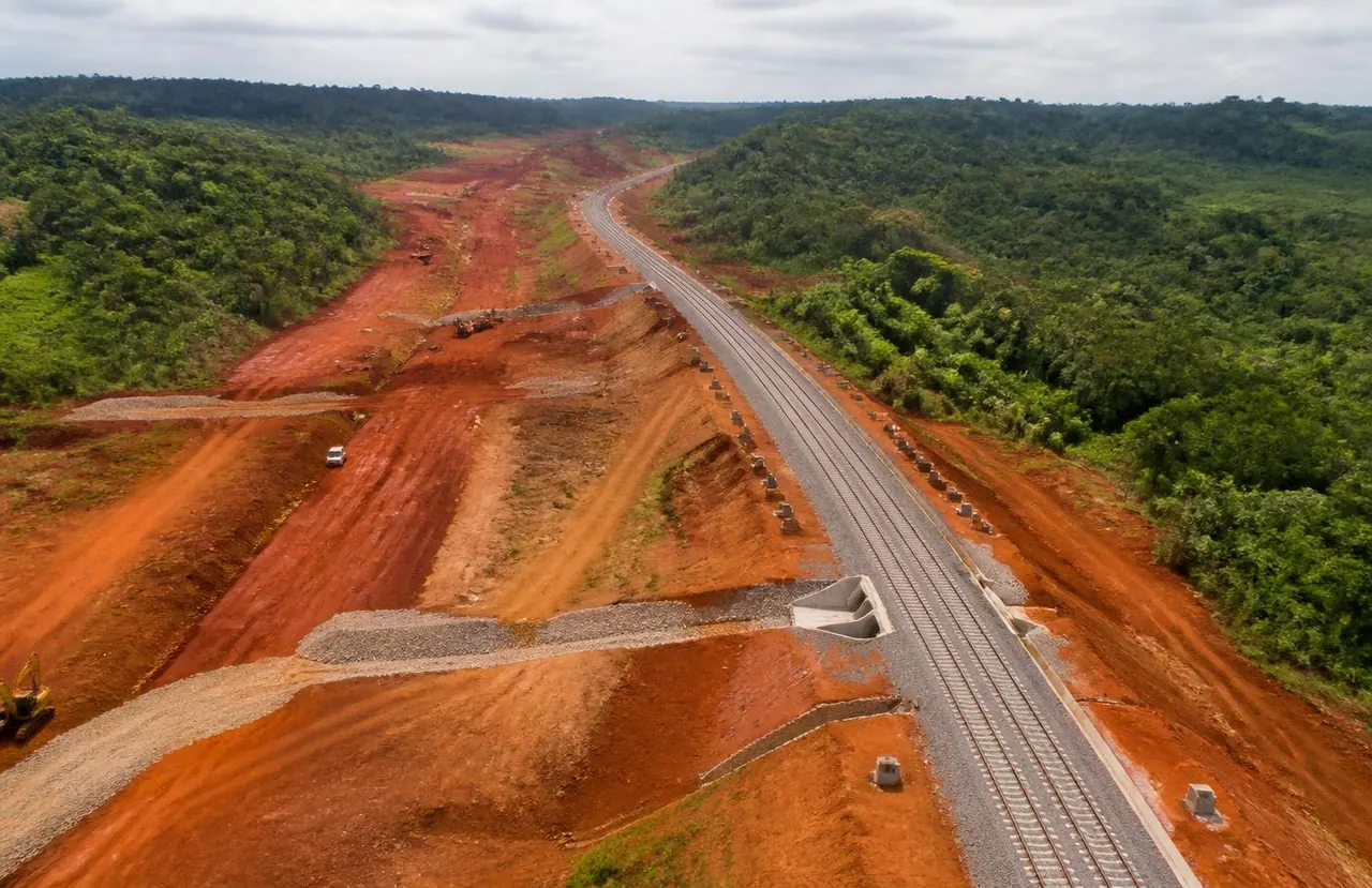 Representative image of a heavy-haul railway spur under construction through West African terrain